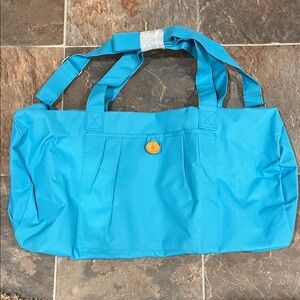 Stylish Blue Duffle Bag with Button Detail